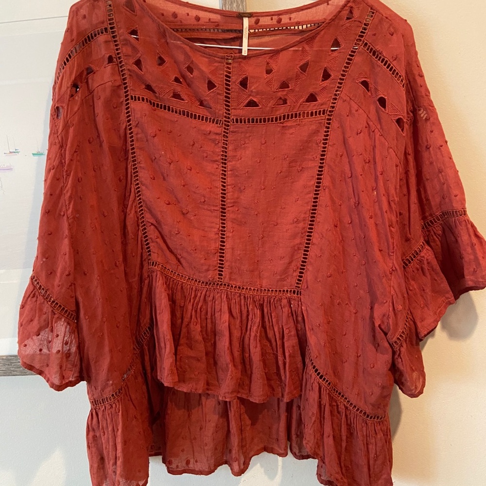 Free People top, peplum in a dark rose color.